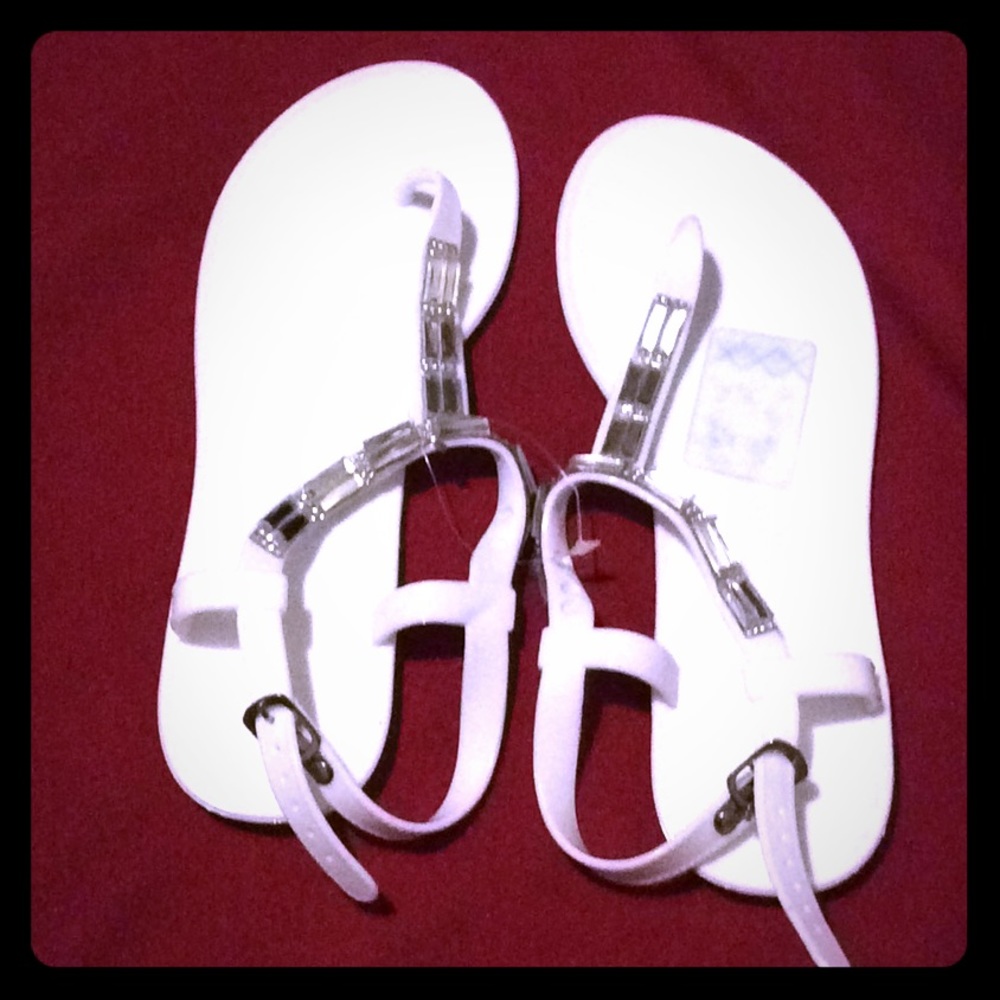 White and silver flat jelly t strap sandals